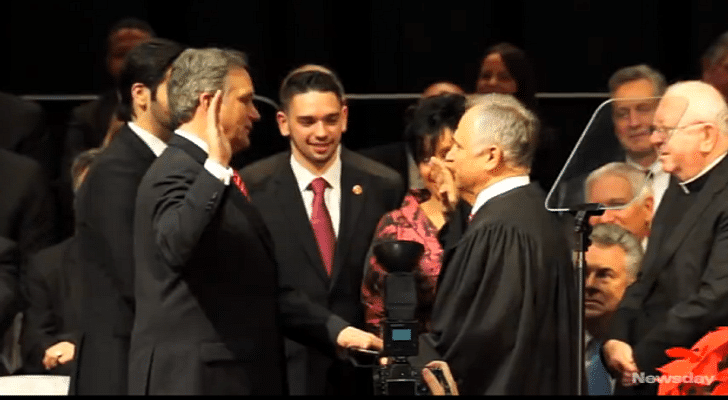 County-Executive-Can-t-Find-a-Bible-So-He-Takes-Oath-of-Office-on-iPad-Video.png